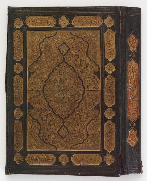 Brown with gold rectangular back panel of a exterior book binding with view of the spine on the right side. Decorated with gilt-stamped floral motifs and cloud bands and a gold central medallion and corner pieces. The spine cartouches have a bit of red colouring.