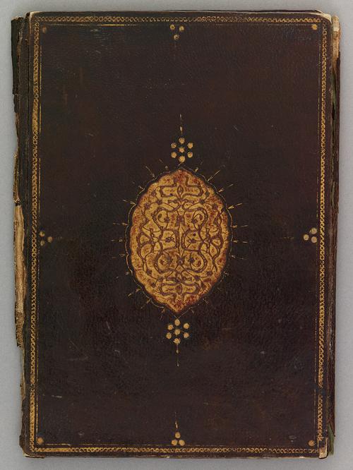Back cover of a Turkish dark-brown leather book binding. Gilt rope border encompassing a gilt-stamped medallion in the centre with some gilt-stamped dots