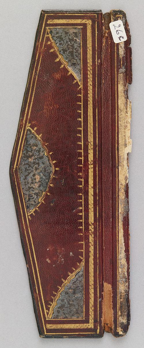 Flap of a red leather bookbinding with gilt stamped scroll border, and a blue medallion in centre along with the corners. The medallion, as well as the corner pieces are outlined with gold. 
