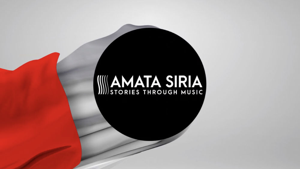 A black circle with the words “Amata Siria Stories Through Music” in white, all against a grey and red backdrop.