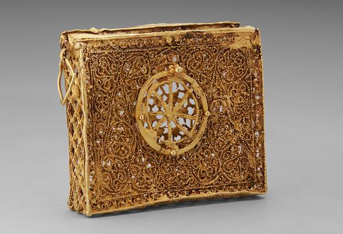 Rectangular Qur’an case, box construction worked with very fine wire and granulation, the face with central circular segmented window in a field of geometricized spiralling foliage forming a pattern of circles and triangles