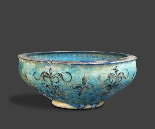Bowl, turquoise glaze, with water-weed motifs on the exterior.