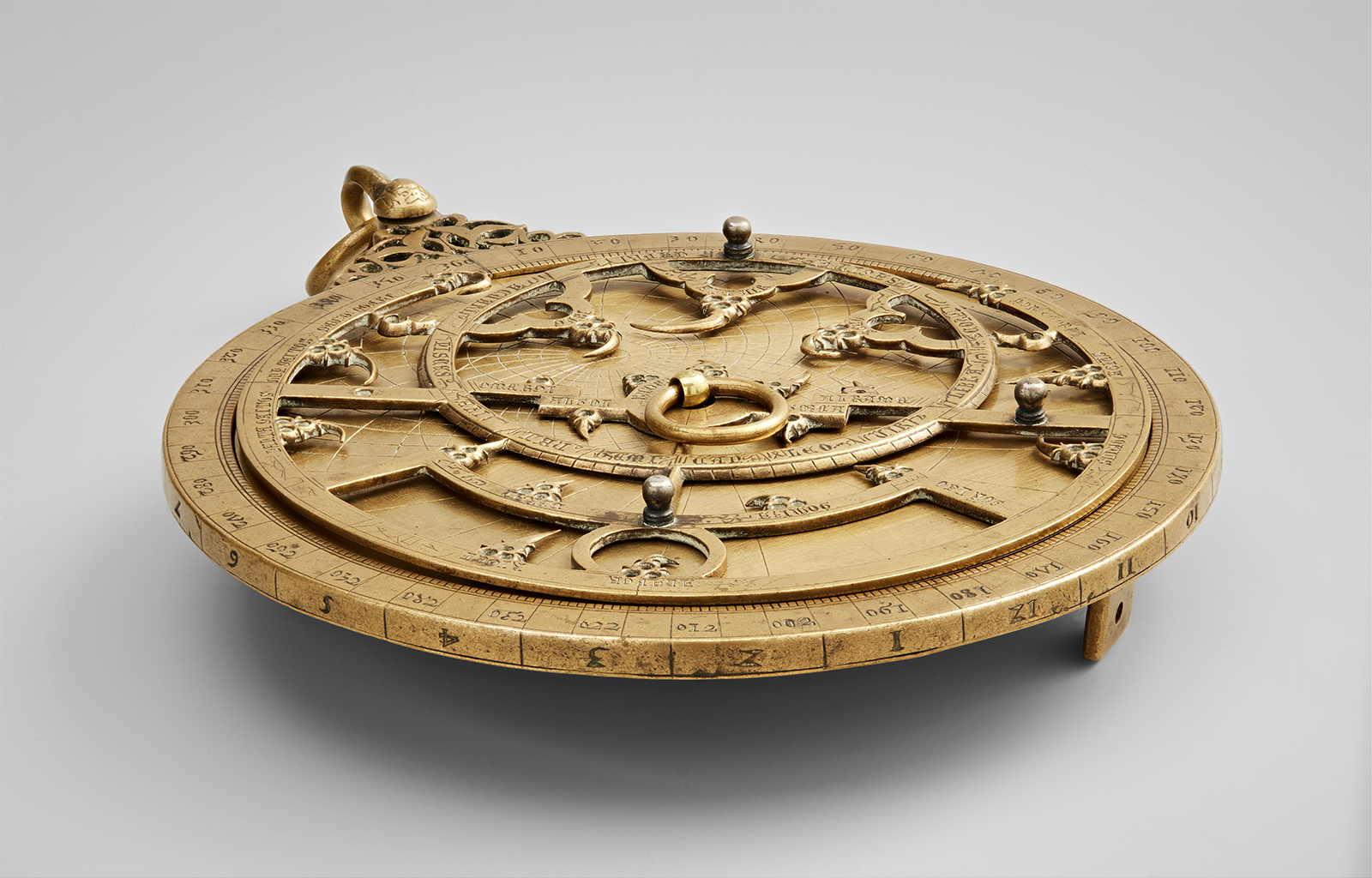 : Made primarily of bronze and inlaid with silver, this 14th-century astrolabe in the Museum’s Collection features inscriptions in three languages: Arabic, Hebrew, and Latin.