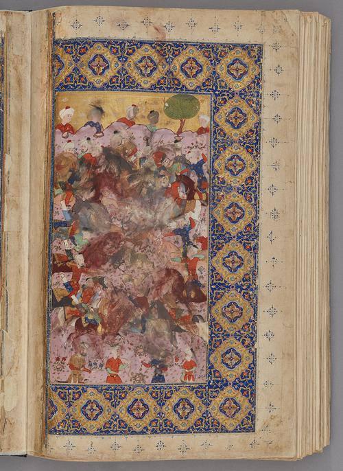 Gold and blue boarder of illuminated cartouche within a rectangular panel, with an inscription, and with floral patterns in pale pink, yellow, and white, and small blue and red lotuses. Surrounding a smudged painting of a hunt-scene.   