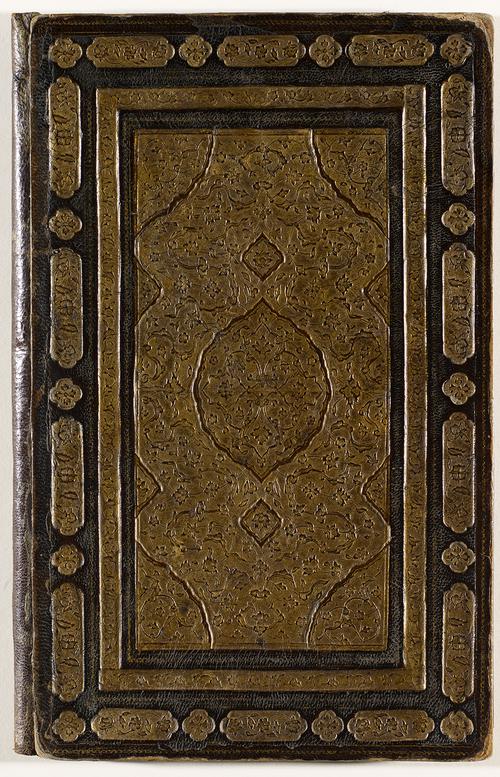 Single cover of the exterior brown leather bookbinding, spine on the left side. With large rectangular panel of gold-stamped floral motifs and cloud bands, with raised central medallions and corner pieces with similar motifs, border bands with floral cartouches