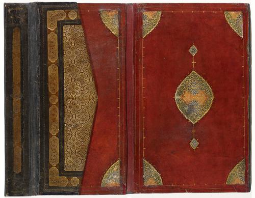 Leather bookbinding, partially folded over. Interior is red leather with golden tooled border and multi-coloured oval designs. Exterior is brown leather with a golden tooled border and interior decoration.